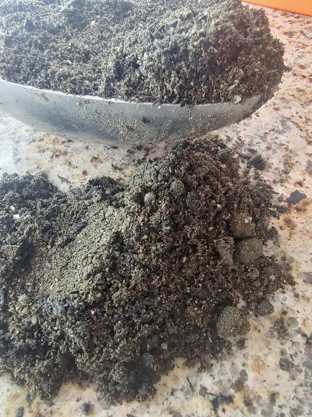 Close-up of Aqua Preta natural substrate supplement granules